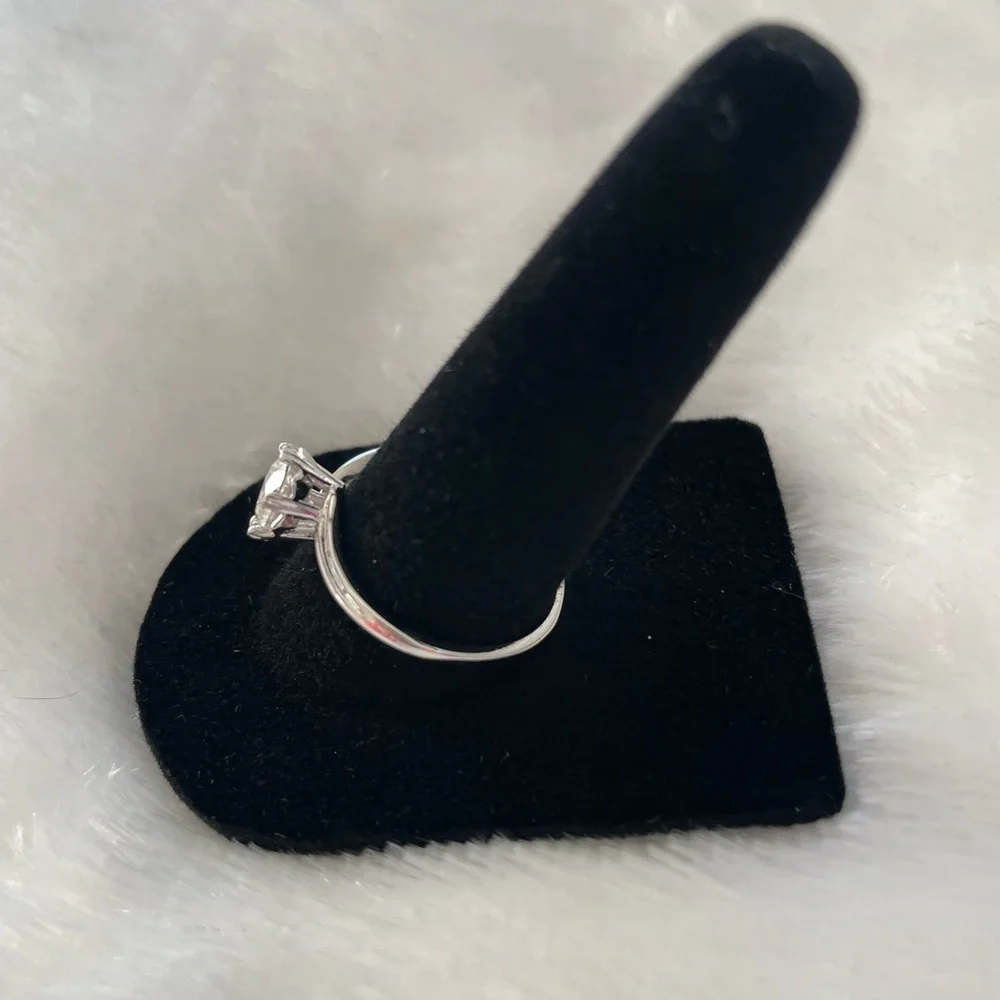 Women’s size 9 solitaire Moissanite ring